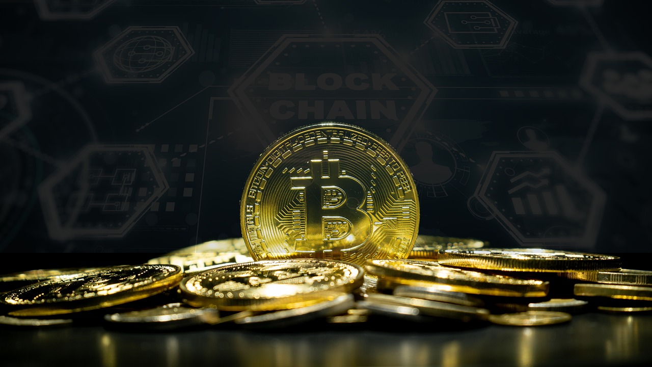 https://pixabay.com/it/photos/bitcoin-criptovaluta-blockchain-6631099/